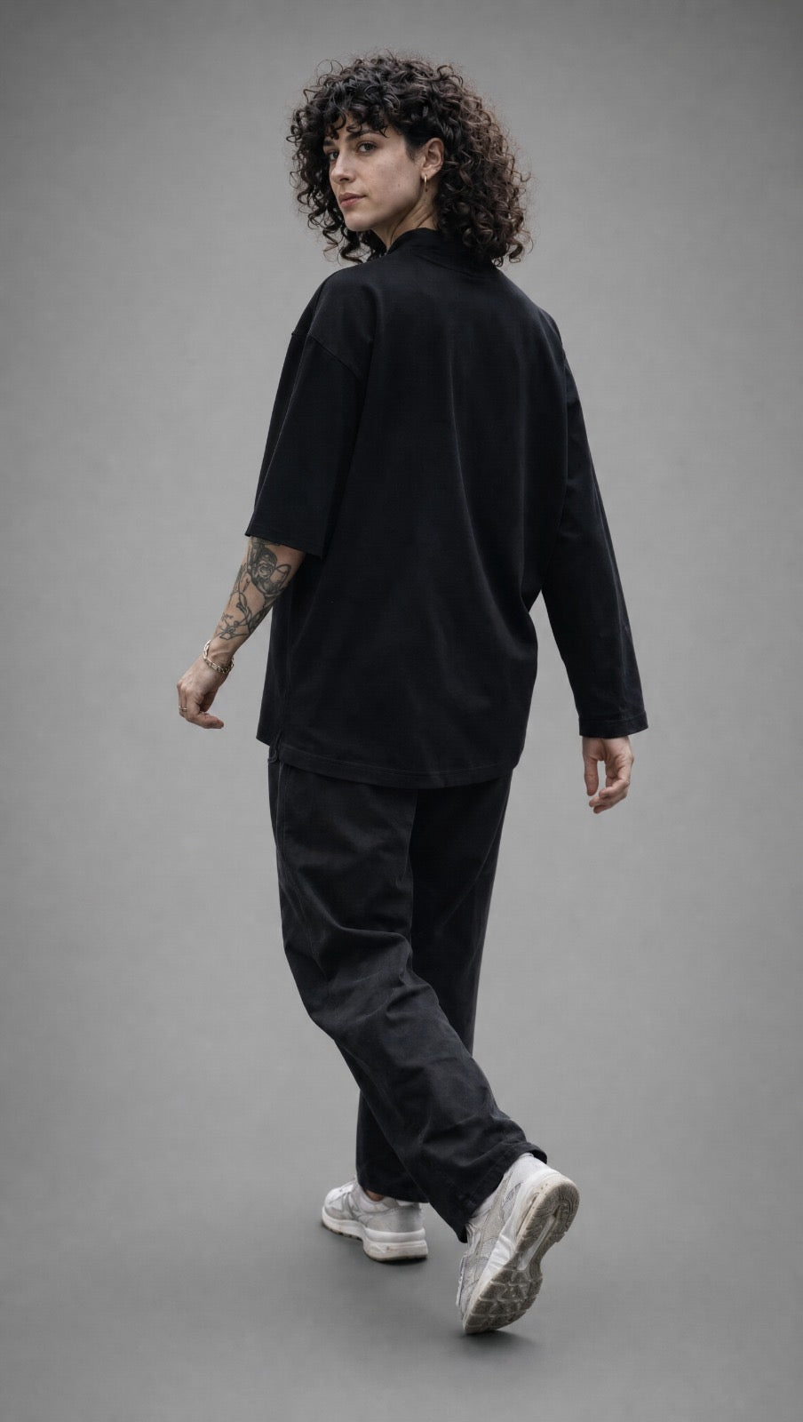 Patented Asymmetrical Sleeve Black Tee